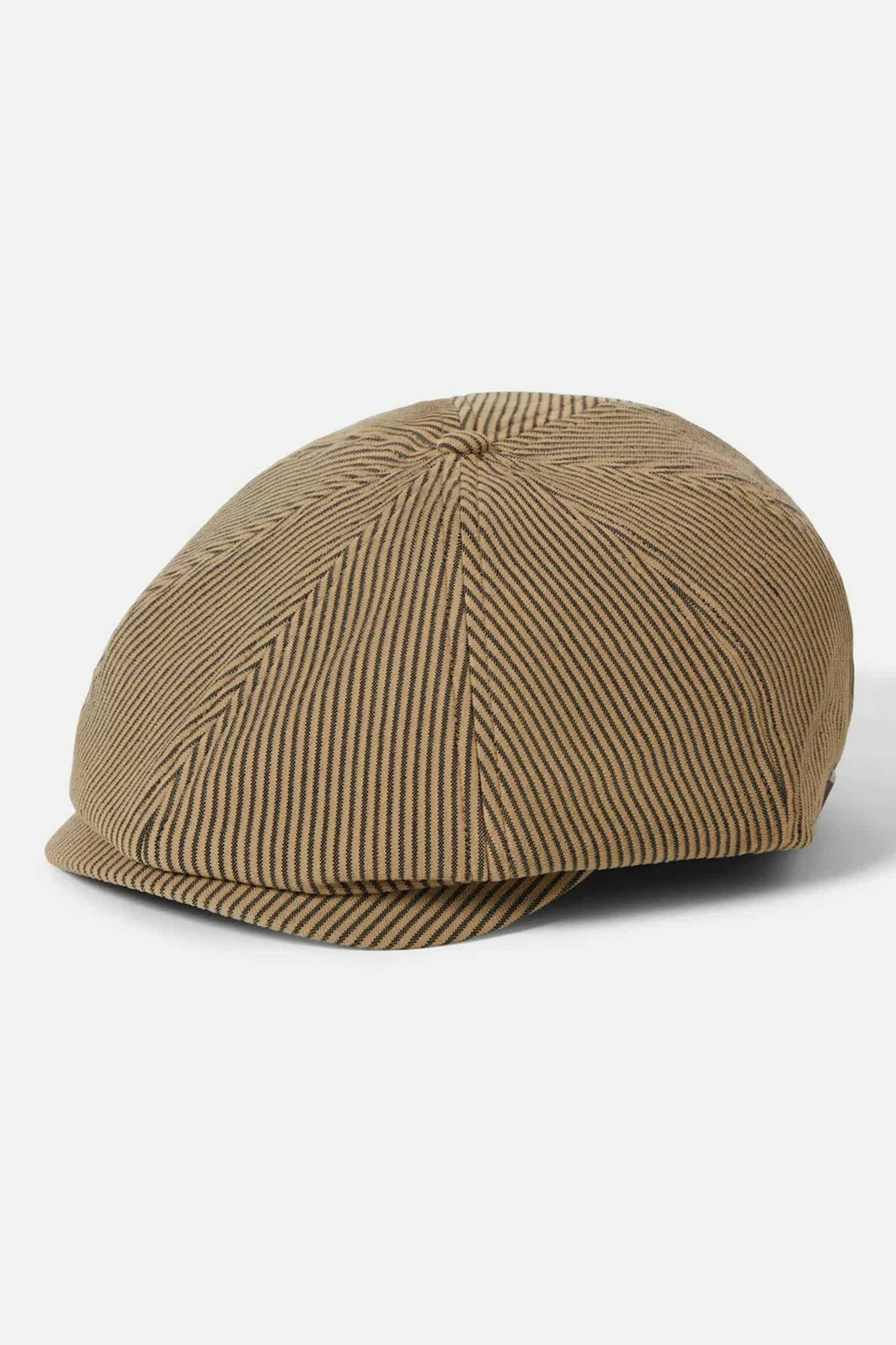 The Brixton Brood Snap Cap by Brixton features brown and black hickory stripes, a rounded crown, and short brim, shown on a light background.