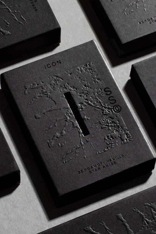 Solid State - Icon: solid cologne in black embossed box, made with Australian native ingredients.