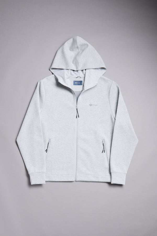 The WearEver Altitude Hoody by WearEver is a light gray, full-zip lightweight hoodie featuring a hood, front pockets, and subtle branding on the left chest, shown laid flat on a plain gray background.