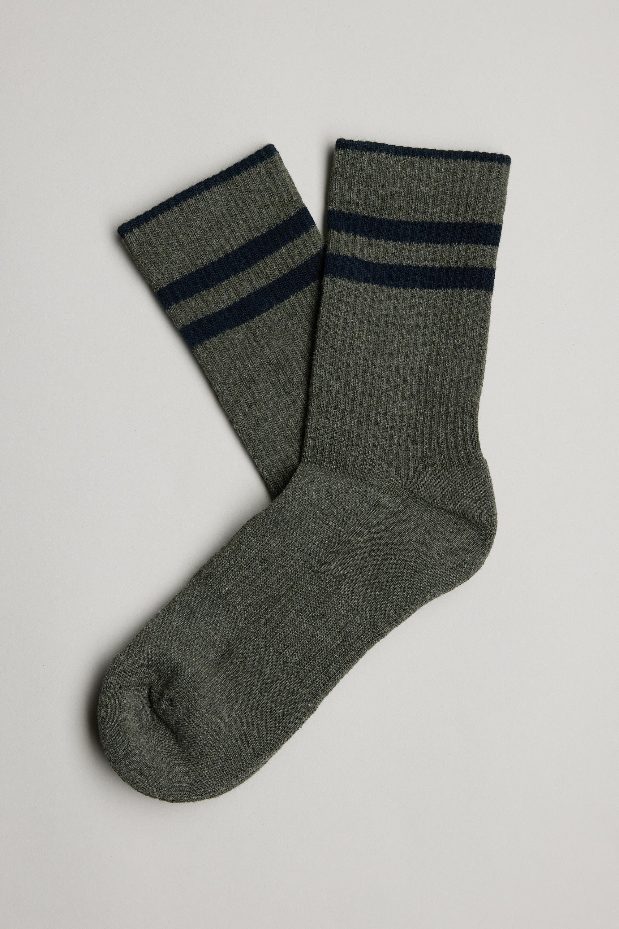A pair of gray Barkers Emerson Sport crew socks with two dark blue stripes on a light background.