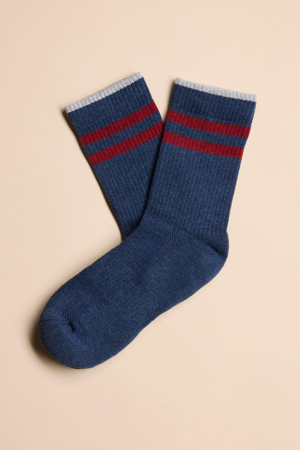 Barkers Emerson Sport Sock: blue crew socks with two red stripes, white cuffs, beige background.
