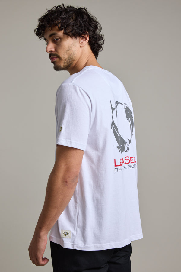 Man wears Legasea Brand Tee with fish graphic, supporting NZ’s marine environment.