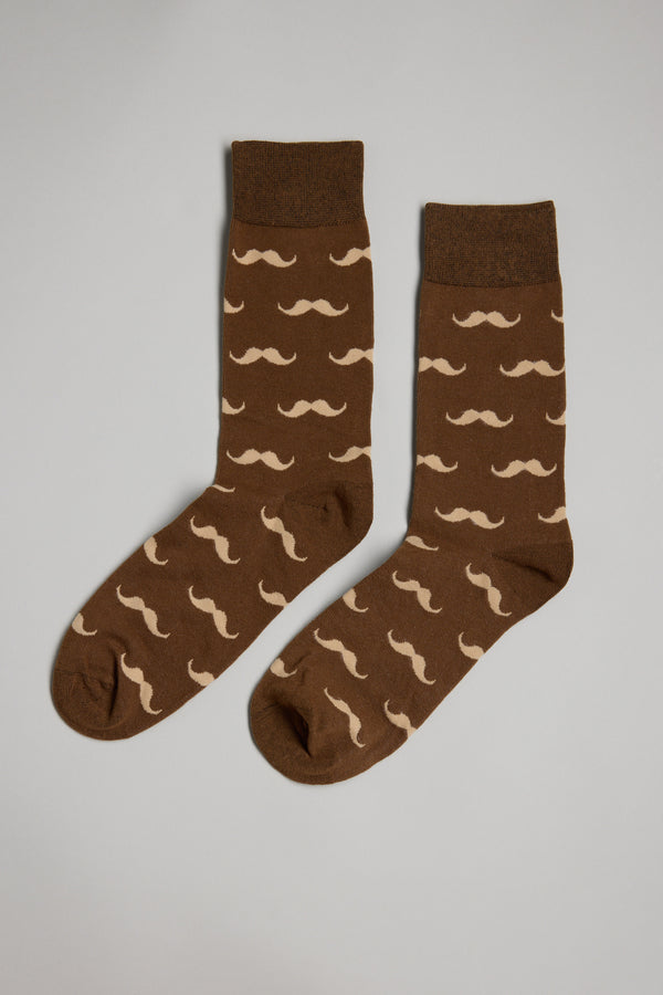 A pair of Barkers Moustache Socks featuring a brown base and beige mustache pattern, laid flat on a light gray background—ideal for Christmas gifts or Secret Santa surprises.