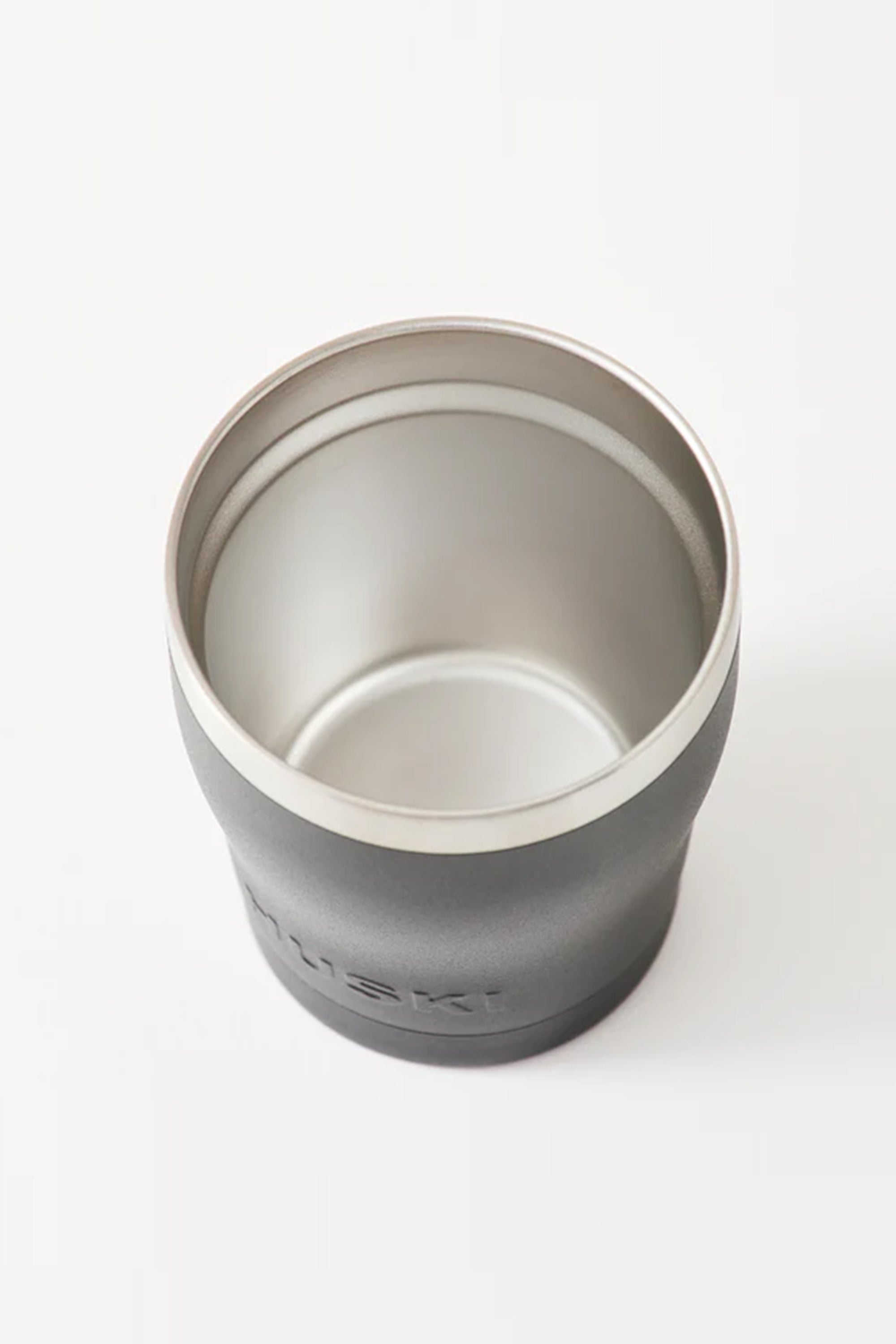 The Huski Short Tumbler 2.0 by Huski is a vacuum insulated tumbler with a matte gray stainless steel design, shown from above against a white background.