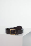 Barkers Baywood Tumbled Leather Belt with goldtone buckle, coiled on a white surface.