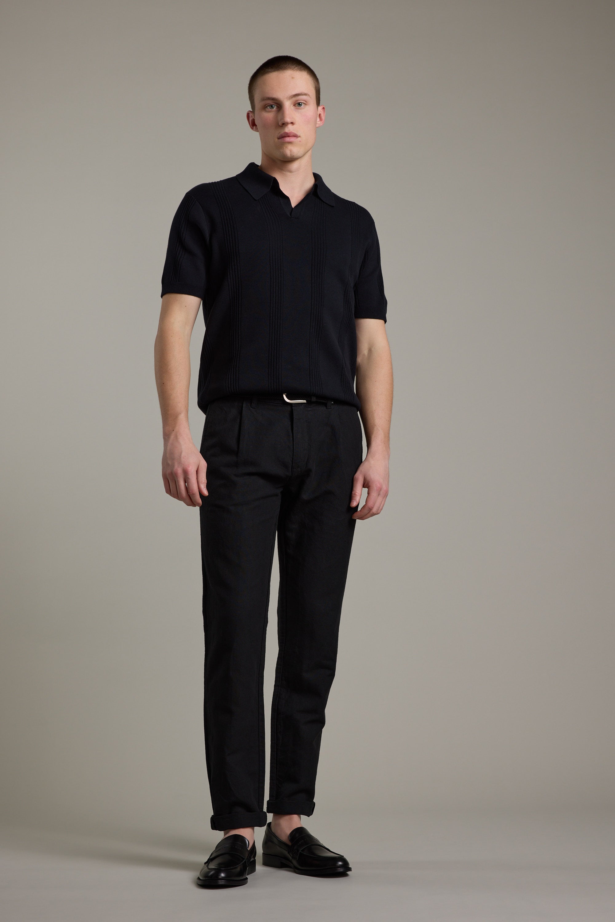 A man in a black shirt and Barkers Newman Linen Pant.