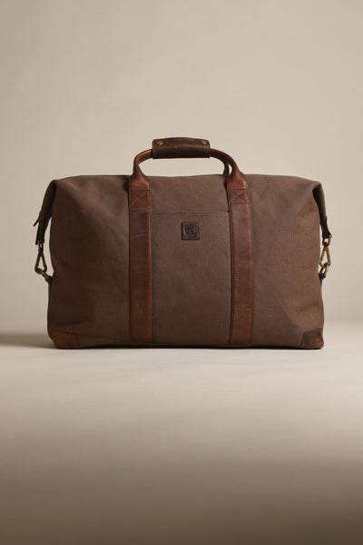 Barkers Newman Canvas Weekender with leather straps on a neutral background.