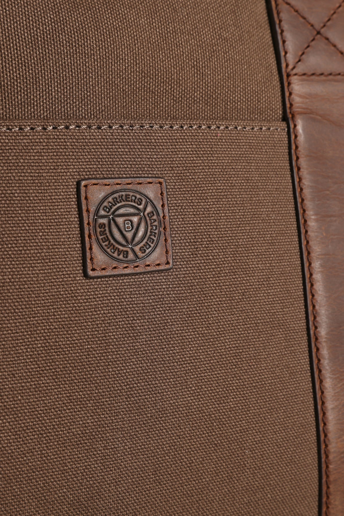 Brown canvas with stitched leather patch, ideal for the Barkers Newman Canvas Weekender bag.