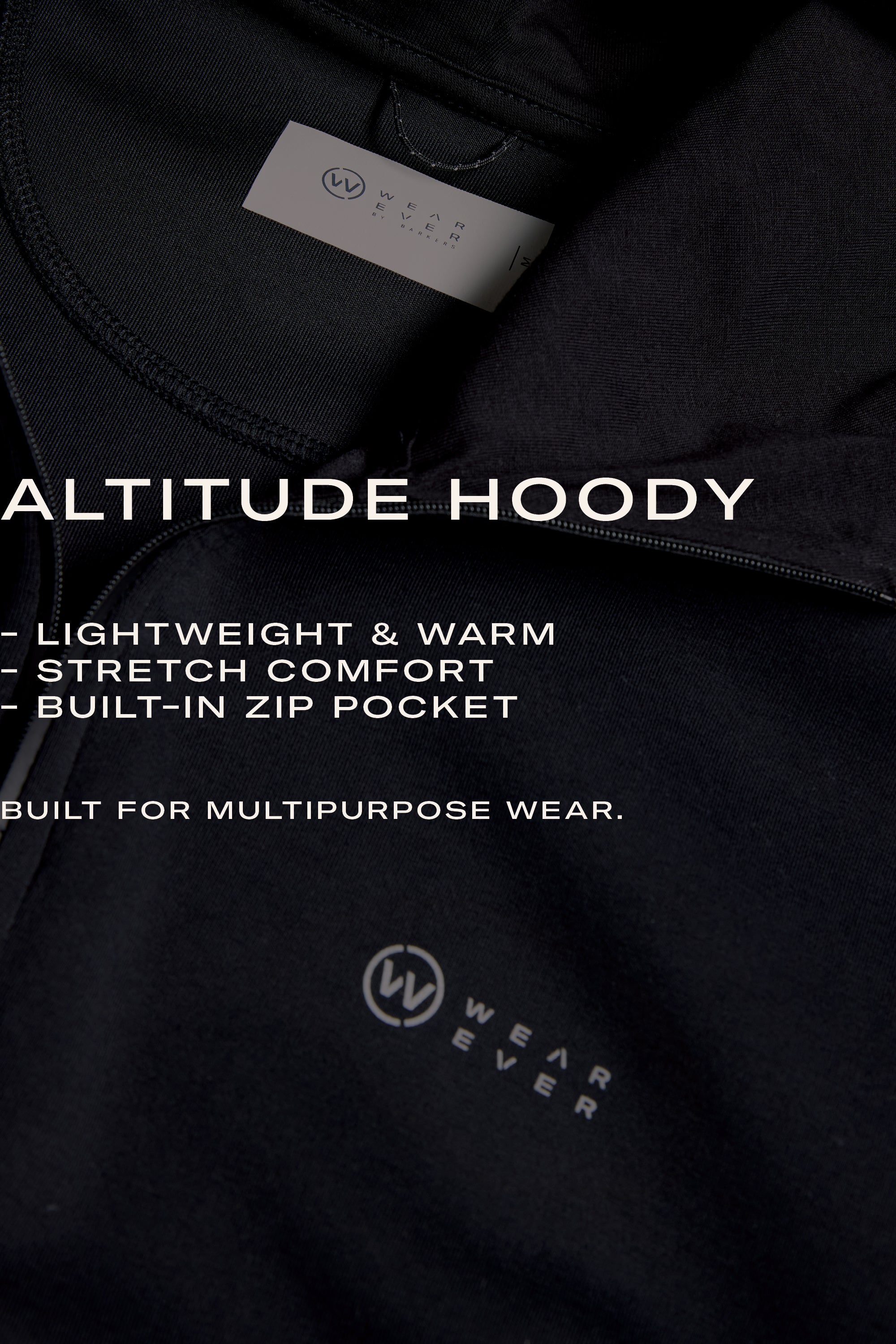 Close-up of the WearEver Altitude Hoody in black—tech fleece for lightweight warmth, stretch comfort, and a built-in zip pocket. The perfect everyday layer from WearEver, designed for versatile wear.