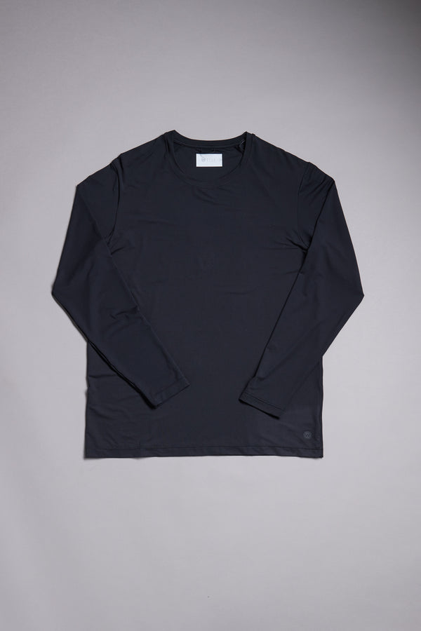 The WearEver Pulse Long Sleeve Tee by WearEver, in black, features moisture-wicking fabric. It’s displayed flat on a light gray background with neatly arranged sleeves and a white tag visible at the collar.