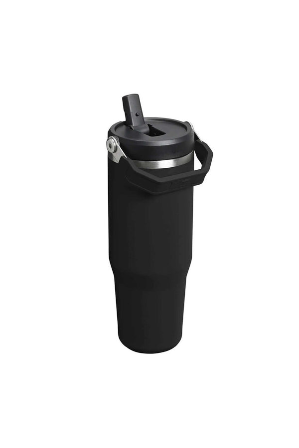The Stanley IceFlow Flip Straw Tumbler 30 OZ in black features vacuum insulation, a handle, and a flip-up straw lid, styled like a classic Stanley tumbler and shown against a plain white background.